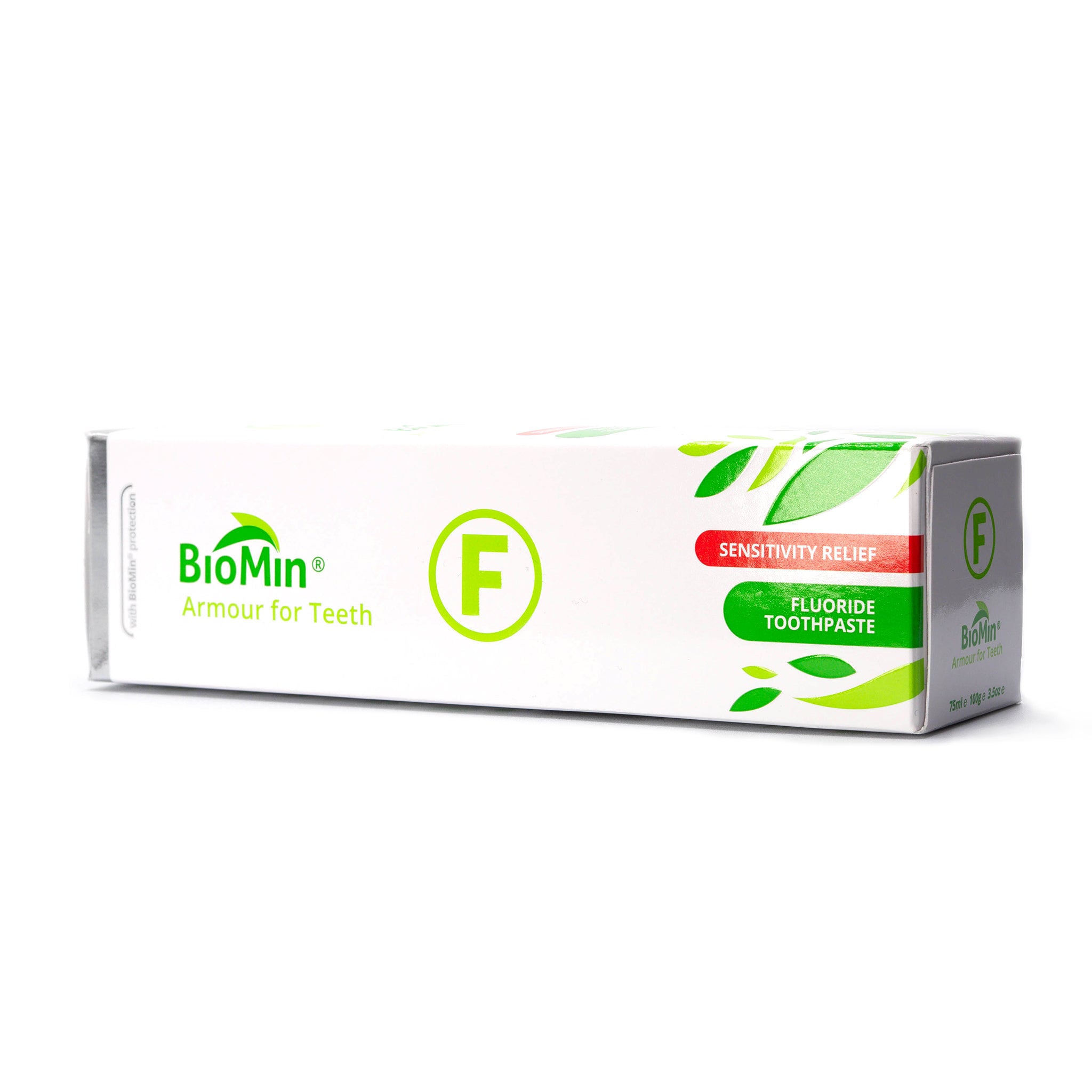 A box of BioMin F toothpaste lies horizontally, labeled "Armour for Teeth" with fluoride protection. The box features green leaf designs and a prominent green "F" symbol indicating fluoride content.