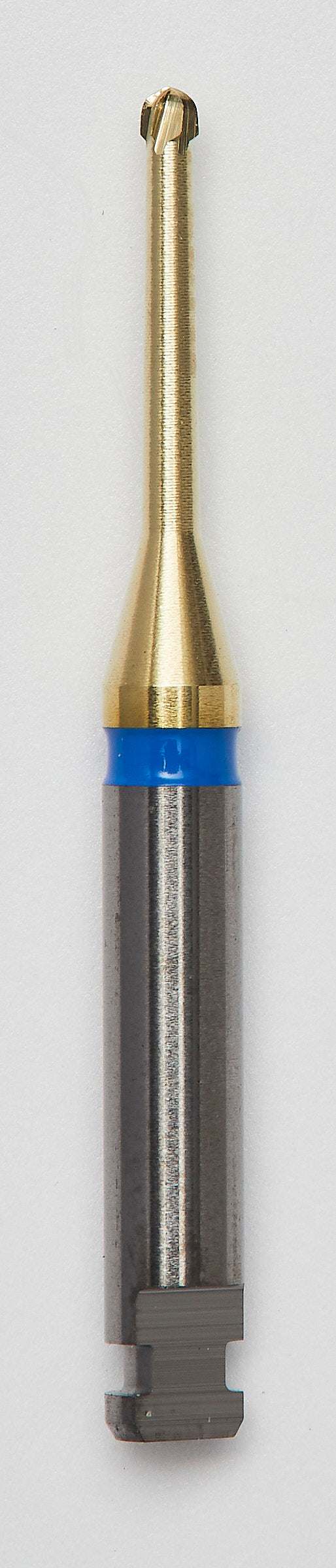 Close-up image of a Blue Cut Carbide Round Bur with Zircon Nitrite Layer, size 010, featuring a gold-colored coating and precision-cut blades. This dental bur offers superior durability, corrosion resistance, and precision for restorative procedures. Pack of 5.