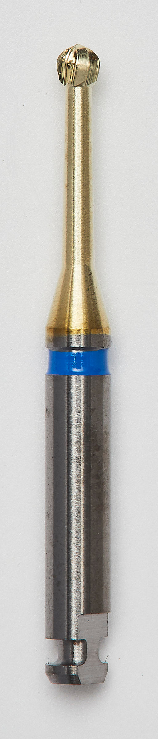 A BLUE CUT Carbide Round Bur 016 with a zircon nitrite wear protection layer, featuring a diamond-cut precision blade and durable design, suitable for dental cavity preparation and restorative procedures.
